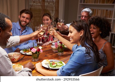 Friends At An Evening Dinner Party