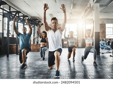 Friends, exercise and lunge in group at gym for workout, core fitness or training together indoors. Diverse class, people or warm up for ab muscle, session and sport for health challenge in gymnasium - Powered by Shutterstock