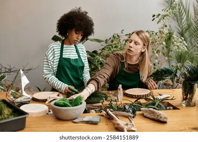 Friends explore their creativity while arranging beautiful succulents in a lively workshop setting.
