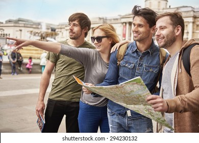 Friends exploring the foreign city - Shutterstock ID 294230132