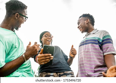 Friends Feeling Very Excited After Checking Their Phone