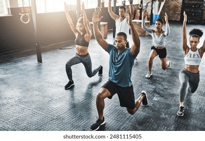 Friends, fitness and lunge in group at gym for workout, core exercise or training together indoors. Diverse class, people or warm up for ab muscle, session and sport for health challenge in gymnasium - Powered by Shutterstock