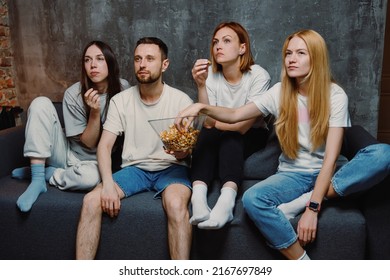 Friends Gathered In The Apartment To Watch The Premiere Of A New Film