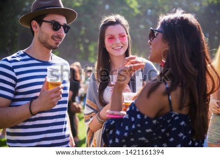 Friends in good mood in festival 