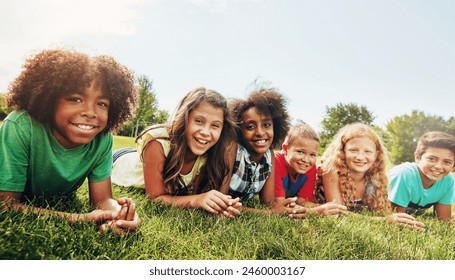 Friends, grass and portrait of children in park for outdoor adventure, bonding or school trip. Diversity, student and kids with smile in nature for connection, friendship or holiday in Washington dc - Powered by Shutterstock