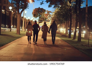 friends group autumn walk city street, night city, party in winter city - Powered by Shutterstock