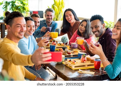 Friends Group Drinking Cappuccino At Coffee Bar Restaurant - People Smiling And Toasting Juice While Taking A Selfie - Friendship Concept With Happy Men And Women At Breakfast Room