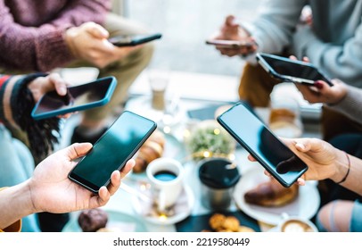 Friends group having fun using mobile smart phone chat - Detail of people hands phubbing content on social media network with smartphone - Genz technology concept with milenials online - Bright filter
