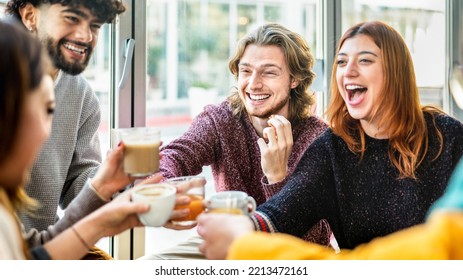 Friends group toasting latte at coffee bar patio - People talking and having fun together at cappuccino restaurant - Life style concept with happy guys and girls at cafe terrace - Bright warm filter
