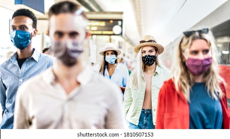 Friends Group Walking At Railway Station - New Normal Travel Concept With Young People Covered By Protective Mask - Focus On Blond Girl With Hat