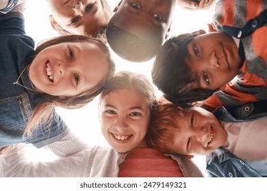 Friends, happy and portrait of children in circle for support, community and playing together outdoors. Diversity, childhood and low angle of girls and boys for youth, child development and education - Powered by Shutterstock