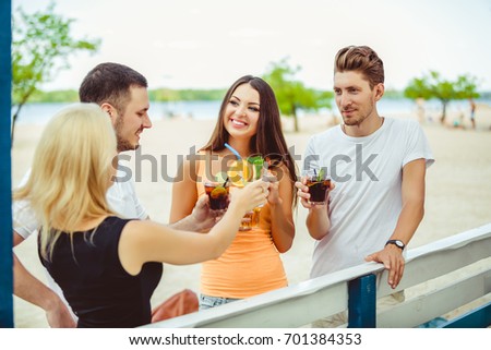 Similar – Group of young people laughing in summer party