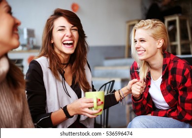 Friends having fun in a cafe. - Shutterstock ID 536596474