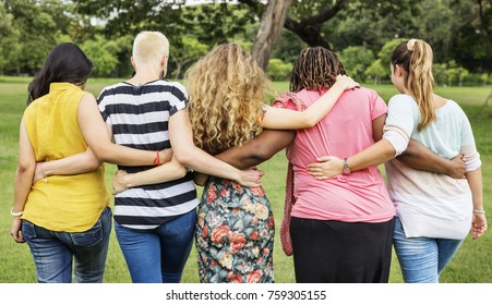 Friends having fun in park - Powered by Shutterstock