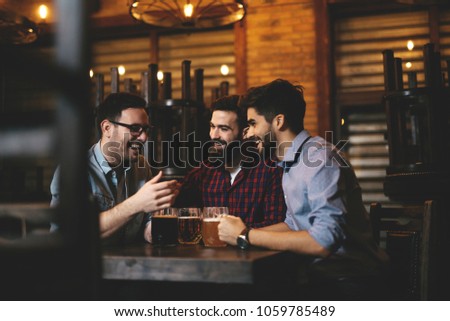 Friends having fun in pub