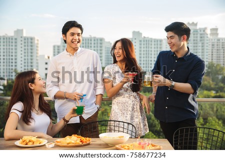 Friends having party on the rooftop
