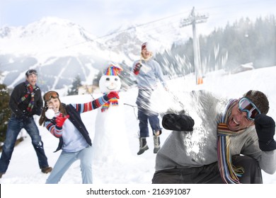 Friends Having Snowball Fight