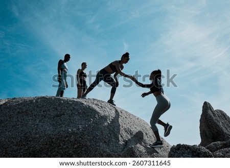 Friends, helping and support on rock for fitness, exercise and adventure or group outdoor. Balance, stability and teamwork or women in nature for workout, training and together with trust in morning