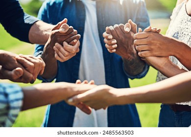 Friends, holding hands and people with group in outdoor therapy for hope, empathy or faith. Solidarity, circle and person in counseling for addiction, mental health or support with trust or kindness - Powered by Shutterstock