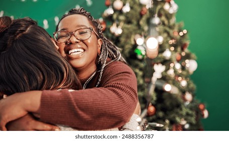 Friends, hug and Christmas tree for festive, holiday and celebration as happy woman in home. Female people, together and bonding with embrace, excited and solidarity for relationship in December - Powered by Shutterstock