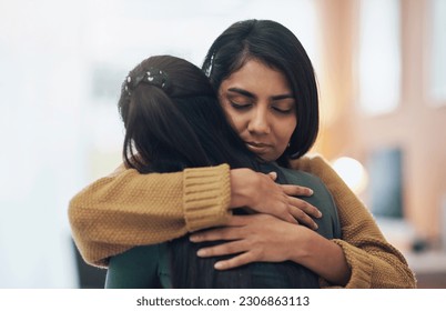 Friends, hug and support of women together in a house with love, care and empathy. Indian sisters or female family in a room while sad, depressed and hugging for comfort, trust and quality time - Powered by Shutterstock