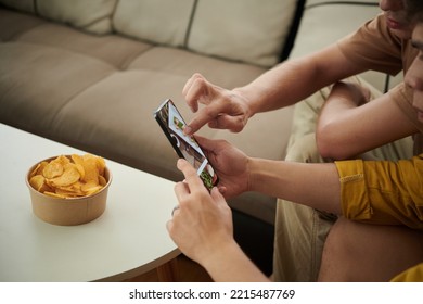 Friends Ordering Food Online Via Delivery Application On Smartphone