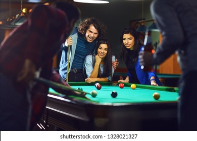 Friends Play Billiards.