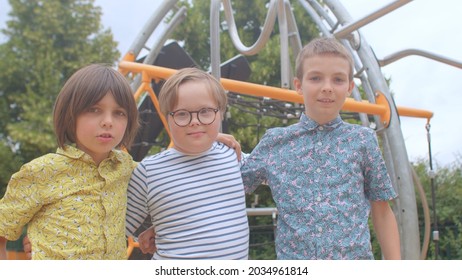 Friends Play Significant Role In Mental And Physical Health. Individuals With Down Syndrome And Developmental Disabilities Included In Education Programs Developed Friendships. Portrait Of Children. 