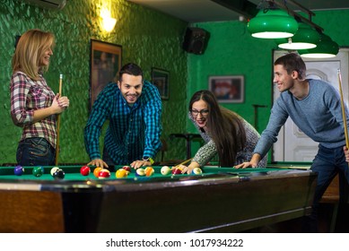 Friends Playing Billiards