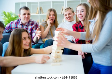 Friends Playing Jenga