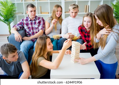 Friends Playing Jenga