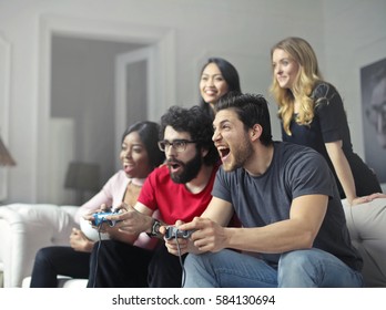 Friends Playing A Video Game