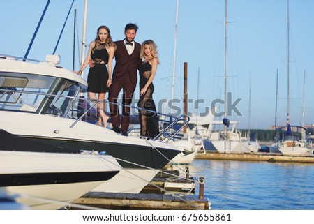 Friends relaxing on their boat