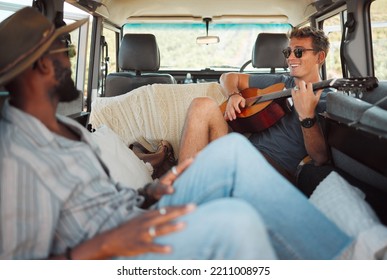 Friends, Road Trip And Guitar In Van Drive Playing Music Or Holiday Song On Summer Vacation Adventure. Diversity, Safari And Happy Men Play Acoustic String Instrument, Singing Or Bonding Having Fun.