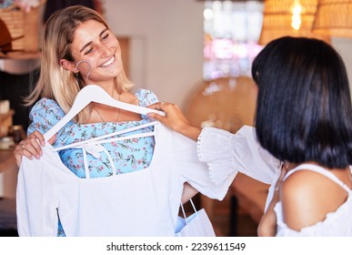 Friends, shopping and fashion advice in boutique, shop or retail store while happy and talking about clothes on sale in Paris. Women excited together at mall making choice for buying designer outfit