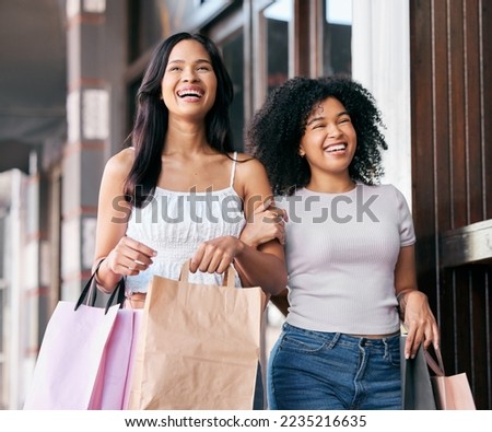Friends, shopping and walking with bags in city, luxury and fashion retail store outdoor with happy smile. Women, promotion and discount with happiness for deal, sale and customer at shopping mall