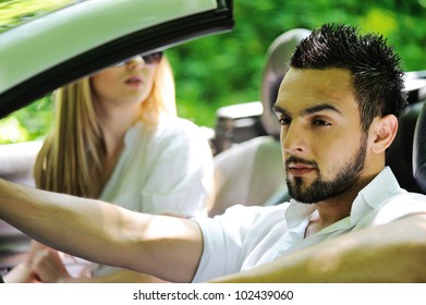 Friends In A Sports Car