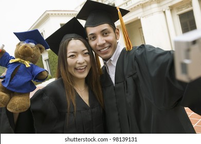 Friends Taking Picture Together At Graduation
