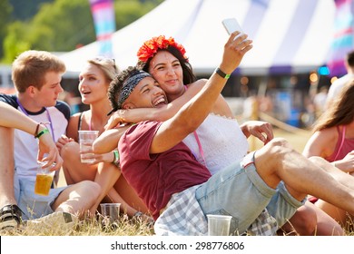 Friends Taking Selfie At A Music Festival