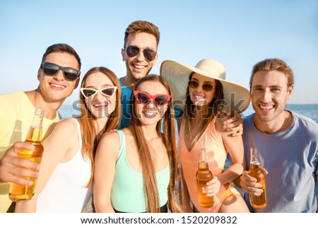 Similar – Group of young people having fun in summer party