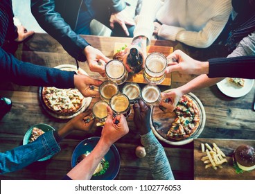 Friends toasting with craft beer