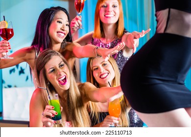 Friends Watching Striptease In Strip Club Grabbing At Female Stripper