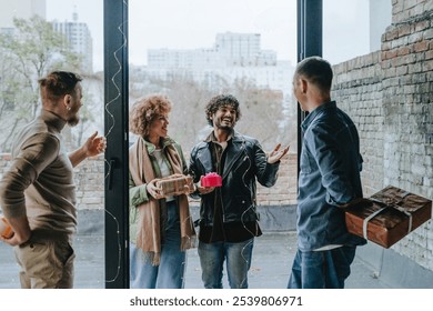 Friends welcoming guests on holiday standing with gifts near door at home. Holiday time concept. - Powered by Shutterstock