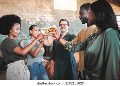 Friends wine tasting, giving cheers and toast celebrate with champagne glasses in cellar, distillery and brewery. Group of happy, diversity and smile people for social event, hangout and winery tour