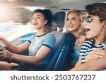 Friends, women and excited with driving car on speed for fun on roadtrip, travel and holiday in Spain. People, vehicle and happy or smile for transportation with laughing for vacation and adventure