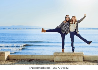 Friends, women and outdoor hug by ocean, bonding and travel to Berlin on weekend trip. People, happy together and peace on vacation to beach water, embrace and united in sisterhood or relationship - Powered by Shutterstock