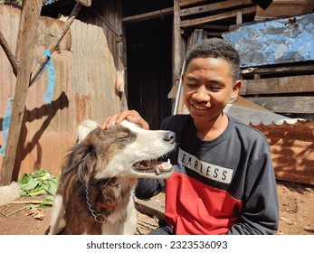 friendship between a teenage boy and his pet dog. Unexpectedb0nds  between humans and pet dogs  - Powered by Shutterstock