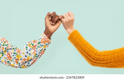 friendship concept, two girl friends putting their fingers together, promise friendship