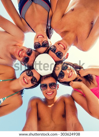 Similar – Young people with their heads together having fun