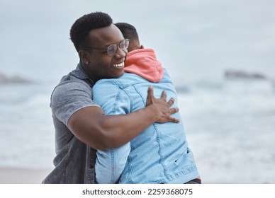 Friendship, love and men hugging on the beach for a reunion while on a summer vacation or holiday. Happy, smile and loving gay couple embracing by the ocean while on a seaside weekend trip in Hawaii. - Powered by Shutterstock